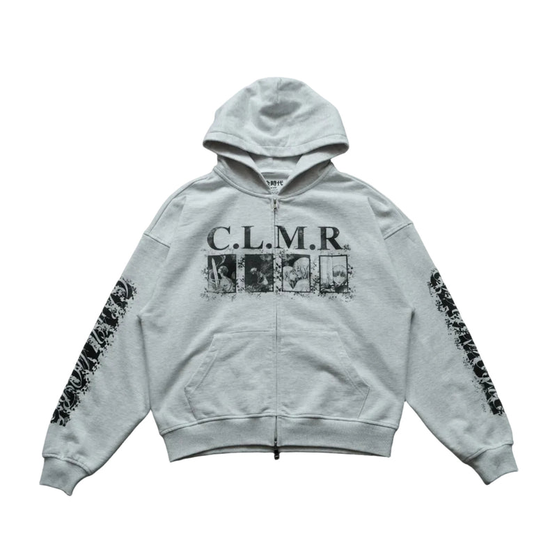 White hoodie with 'C.L.M.R.' text and graphic design on a gray surface